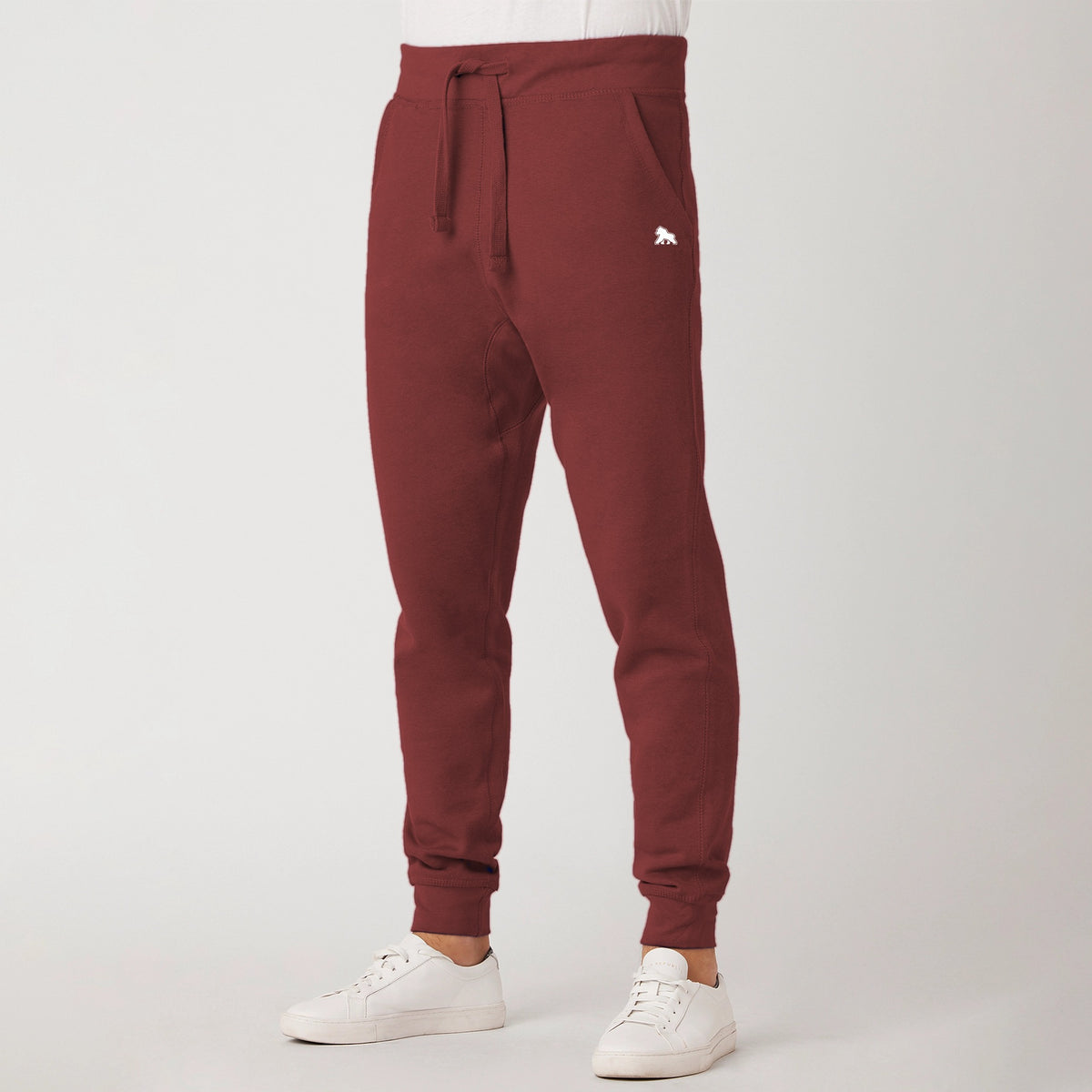 FIT APE men's premium fleece joggers in uakari red - side view, tapered fit