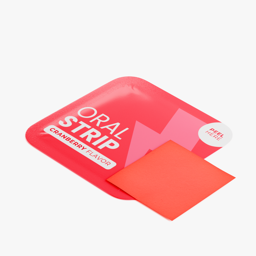 Red FIT APE Cranberry Energy Strips packet beside a red oral strip