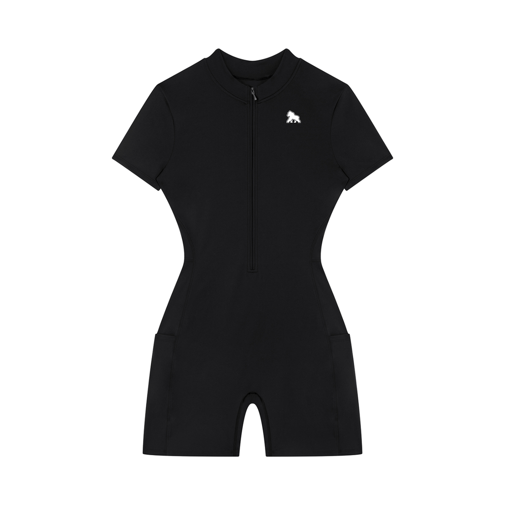 Black FIT APE short-sleeve quarter-zip romper with white chest gorilla, front view