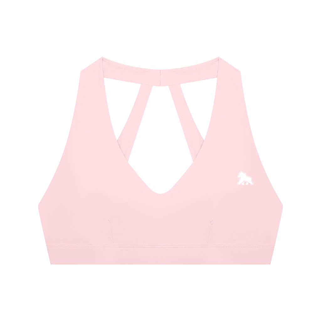 Pale pink FIT APE halter sports bra with cutout straps and white gorilla, front view