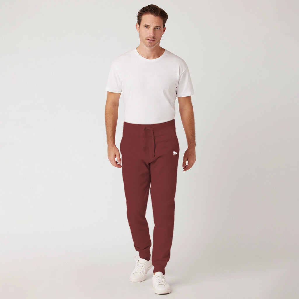 FIT APE men's premium fleece joggers in uakari red - front view on model