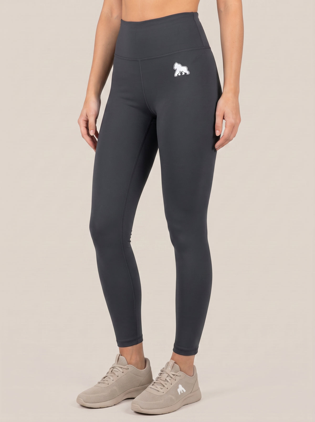 Charcoal FIT APE women's high-waist leggings, angled front view on a model