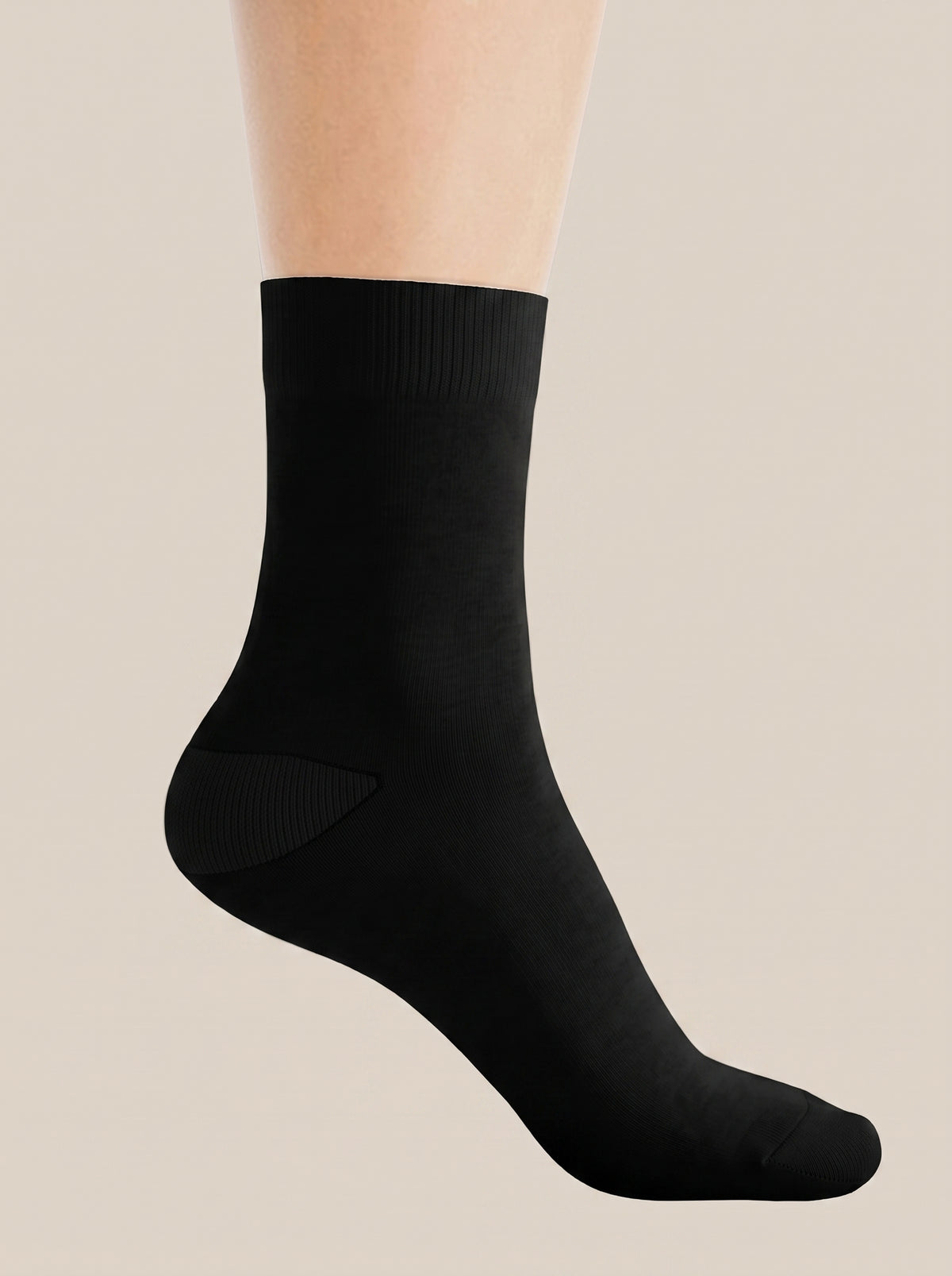 Black FIT APE crew sock on a foot, plain side view