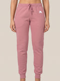 Pink FIT APE women's drawstring sweatpants, front view on a model