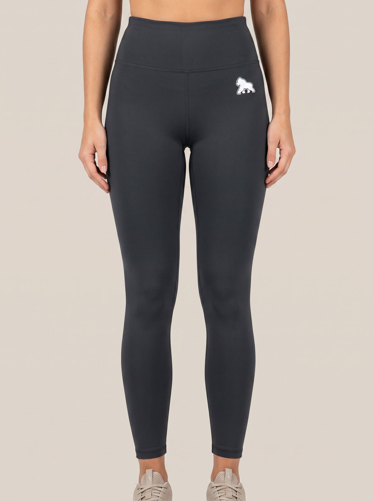 Charcoal FIT APE women's high-waist leggings with white hip gorilla, front view on a model