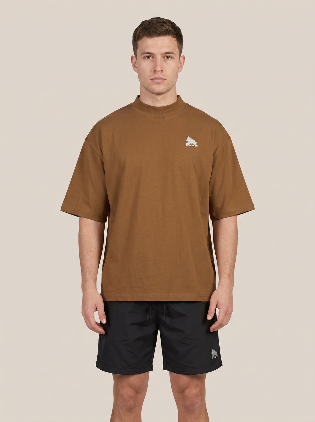 Brown FIT APE men's oversized tee on a model, front view