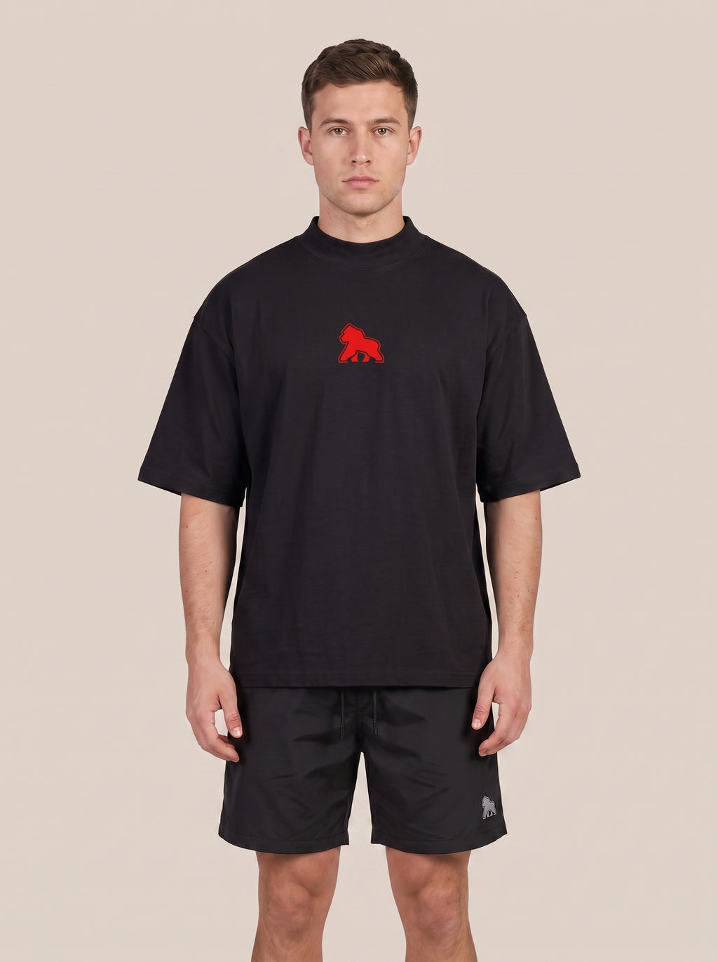 Black FIT APE men's classic tee with red chest gorilla, front view on a model
