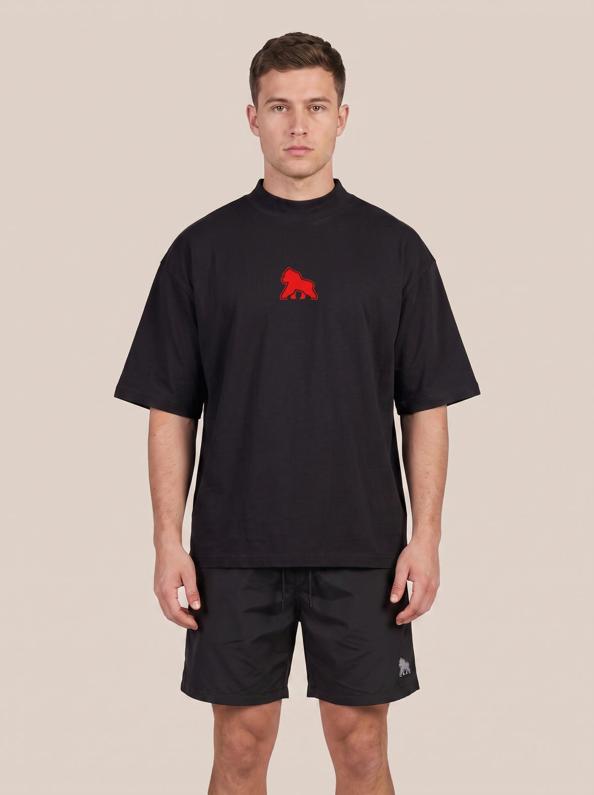 Black FIT APE men's classic tee with red chest gorilla, front view on a model