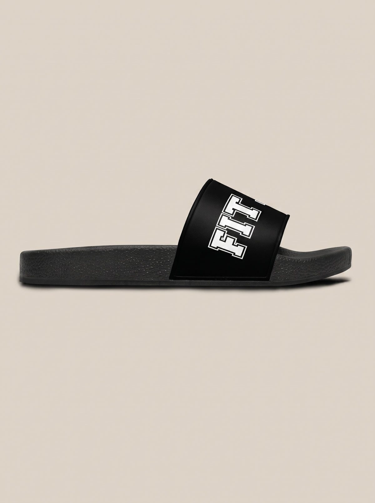 Black women's FIT APE slide, side view showing the flat sole and wide strap