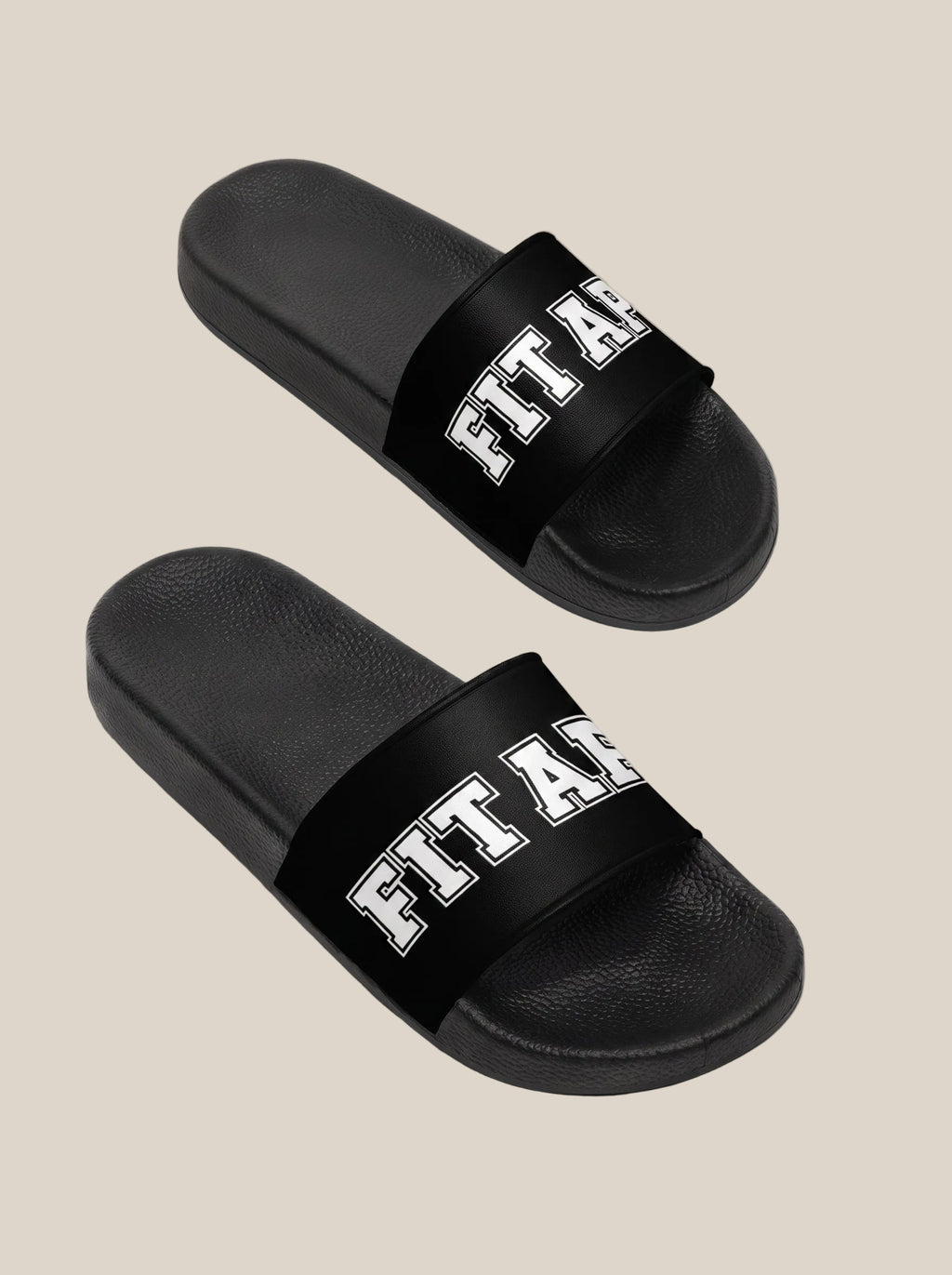 Pair of black women's FIT APE slides arranged diagonally