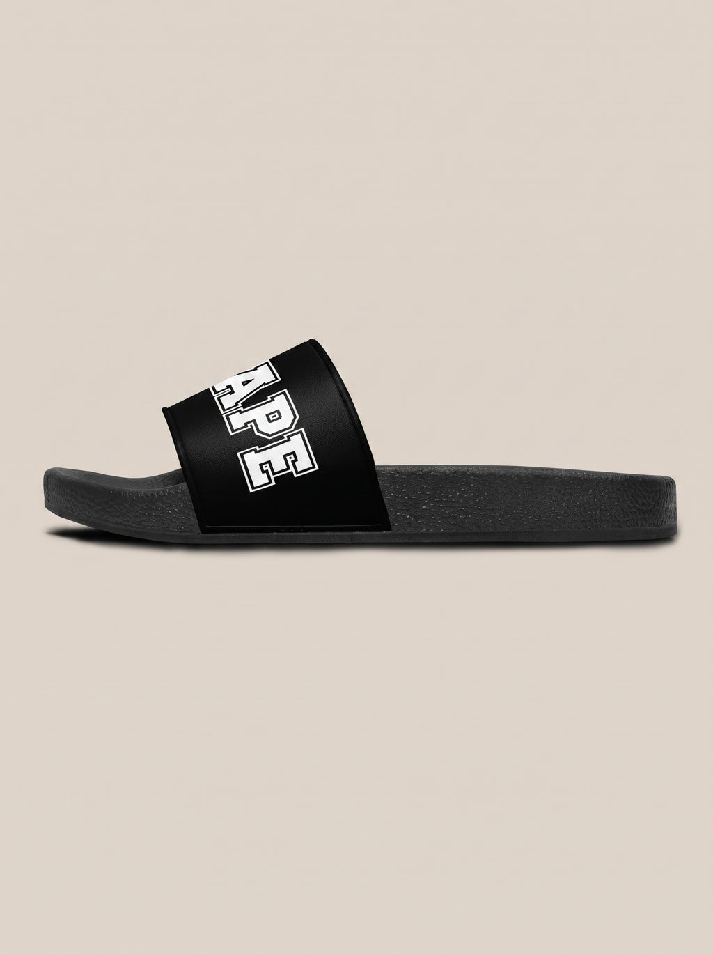 Black women's FIT APE slide facing left, side profile