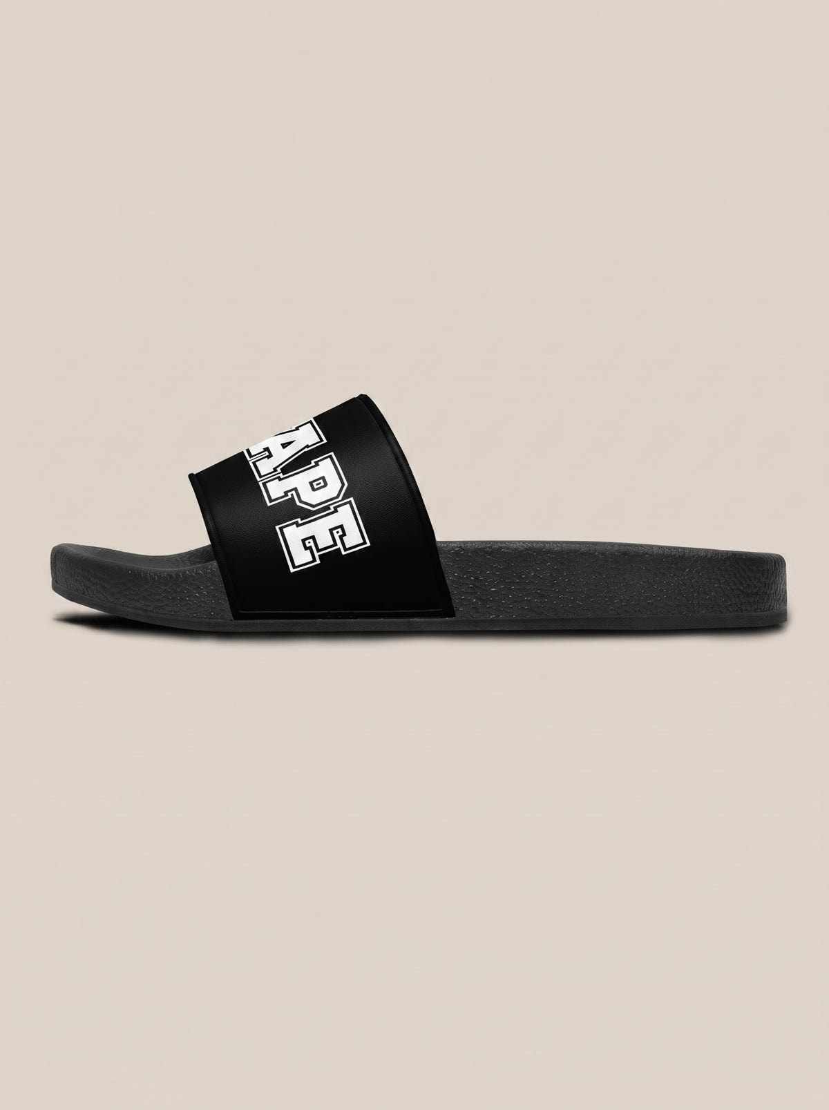Black women's FIT APE slide facing left, side profile