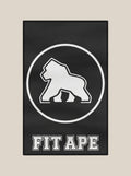 Black FIT APE gym towel with a large white gorilla emblem and lettering, vertical view
