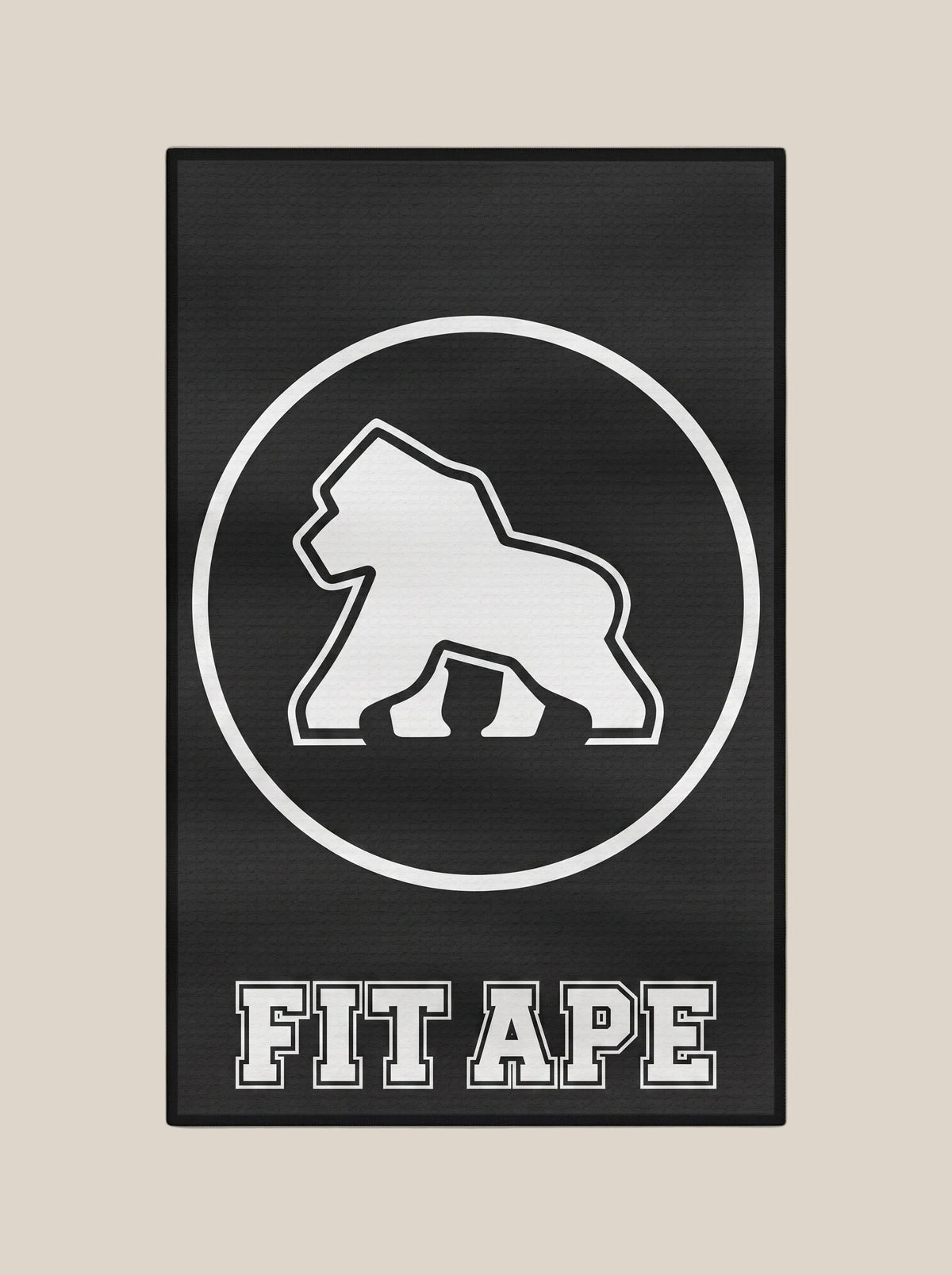 Black FIT APE gym towel with a large white gorilla emblem and lettering, vertical view