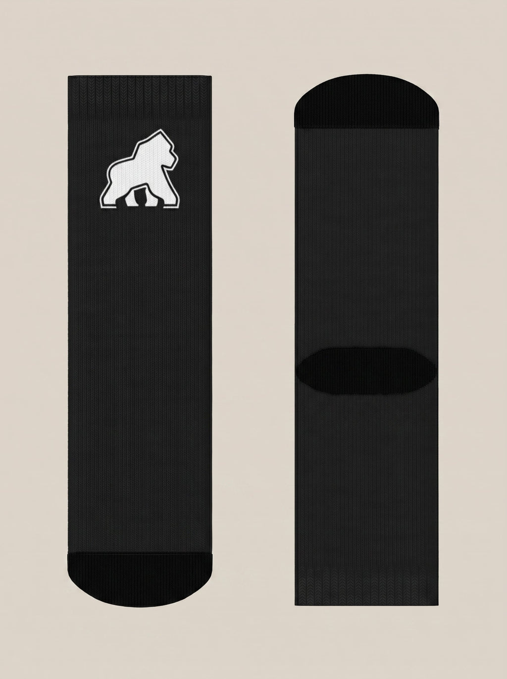 Black FIT APE crew socks laid flat, showing the white gorilla emblem and soles